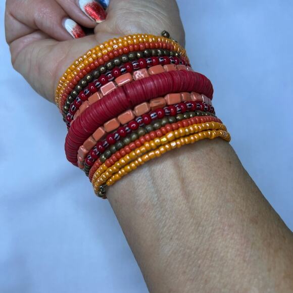 other Jewelry - Boho Coiled beaded bracelet. Orange and deep pink tones